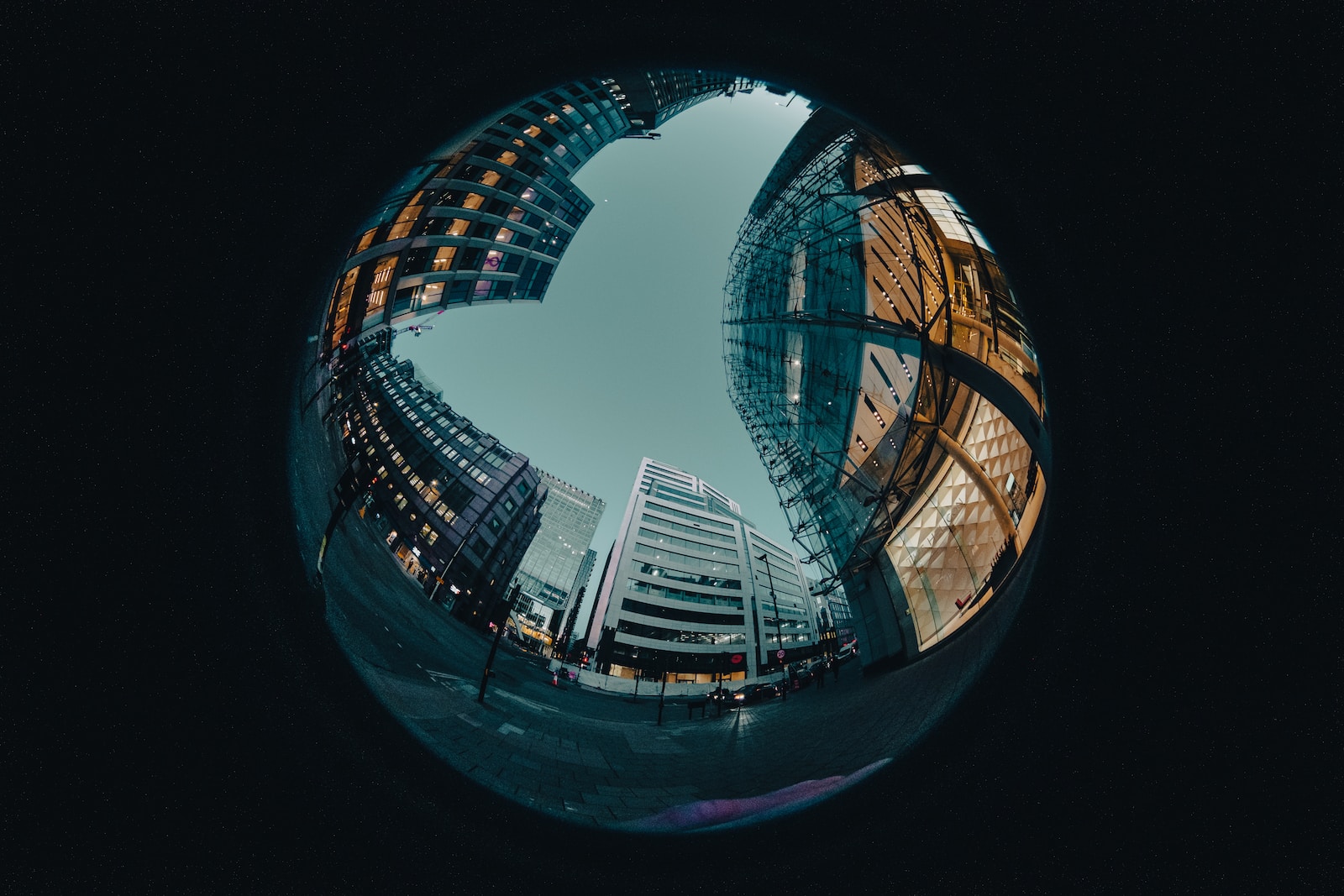 Photo by Kevin Grieve a fish eye view of a city at night